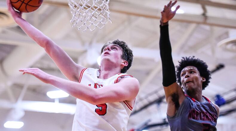 Madison’s Grant Whisman puts up a shot. NICK GRAHAM/STAFF FILE PHOTO