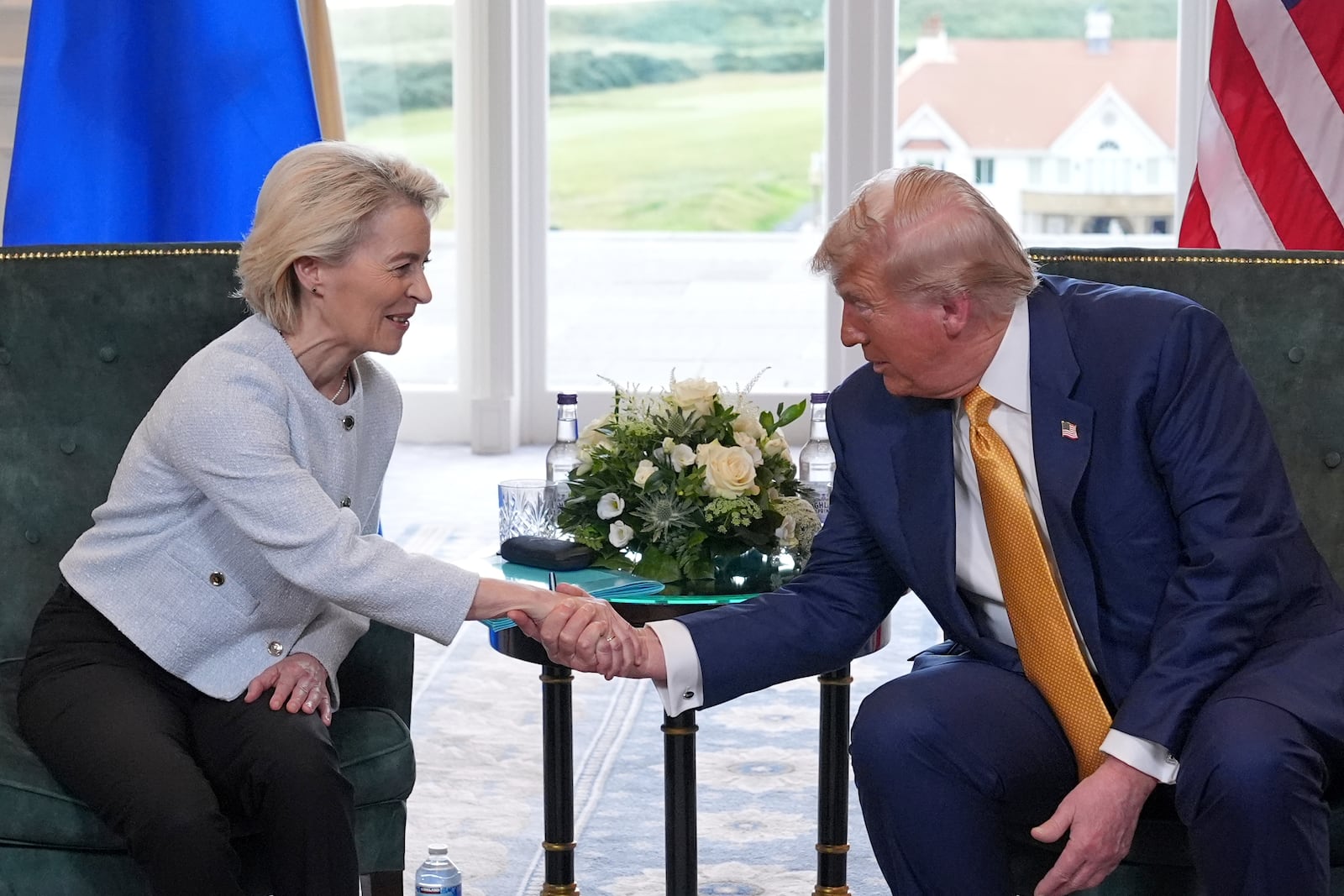 President Donald Trump shakes hands with European Commission President Ursula von der Leyen as they meet at the Trump Turnberry golf course in Turnberry, Scotland Sunday, July 27, 2025. (AP Photo/Jacquelyn Martin)