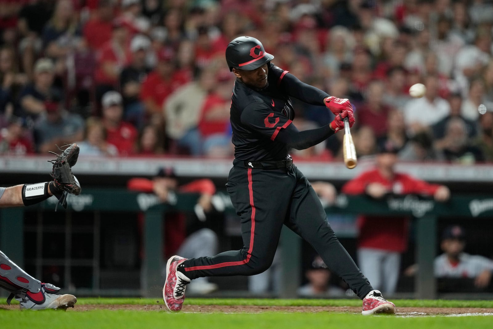 Cincinnati Reds' Ke'Bryan Hayes hits a solo home run during the eighth inning of a baseball game against the St. Louis Cardinals Friday, Aug. 29, 2025, in Cincinnati. (AP Photo/Carolyn Kaster)