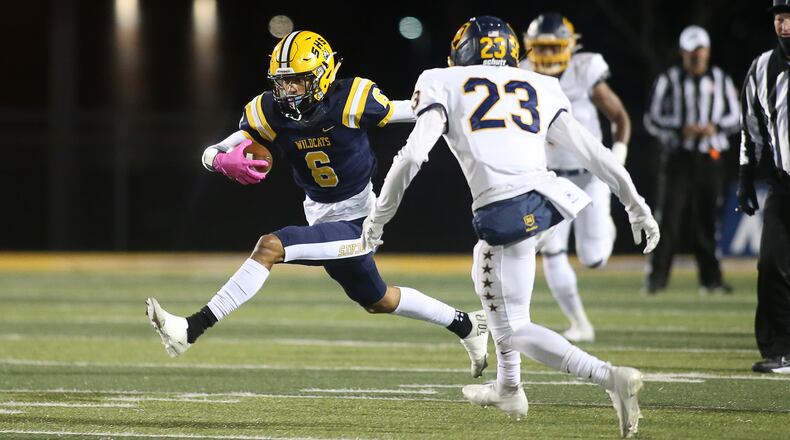 Springfield's Shawn Thigpen runs after a catch against Moeller in the Division I state semifinals at Sidney High School on Friday, Nov. 26, 2021. Michael Cooper/CONTRIBUTED