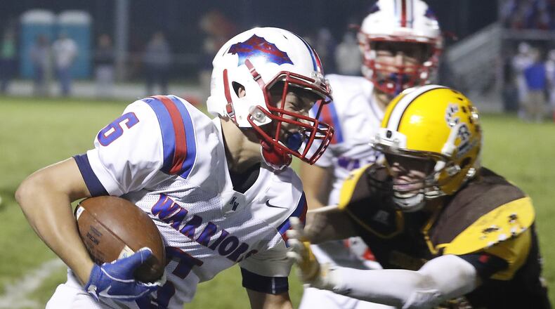 Nortwestern’s Ben VanNoord prepares to be tackled by Kenton Ridge’s Drew Wichael last season. Bill Lackey/Staff