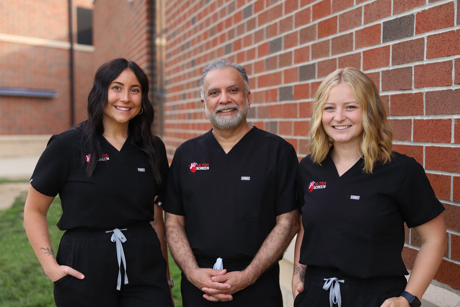 Registered cardiac sonographers Emma Beedy (left) and Alyssa Souders (right) with board-certified cardiologist Dr. Faiq Akhter  (center). Together, they are launching a mobile cardiac screening service called Ultrascreen. ELIZABETH NEWMAN PHOTOGRAPHY/CONTRIBUTED