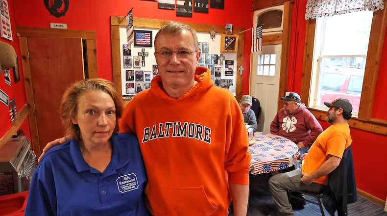 Matt Warner and his wife, Mandie, the owners of Sis's Restaurant in Catawba, in their restaurant. Matt and his wife, Mandie, have decided to close the restaurant due to rising food costs. BILL LACKEY/STAFF