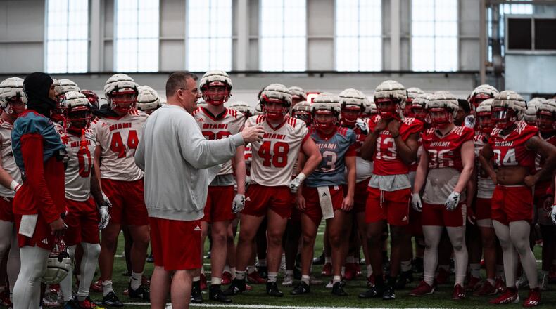 Miami football coach Chuck Martin talks with his team during a recent spring practice in Oxford. Miami Athletics/CONTRIBUTED PHOTO