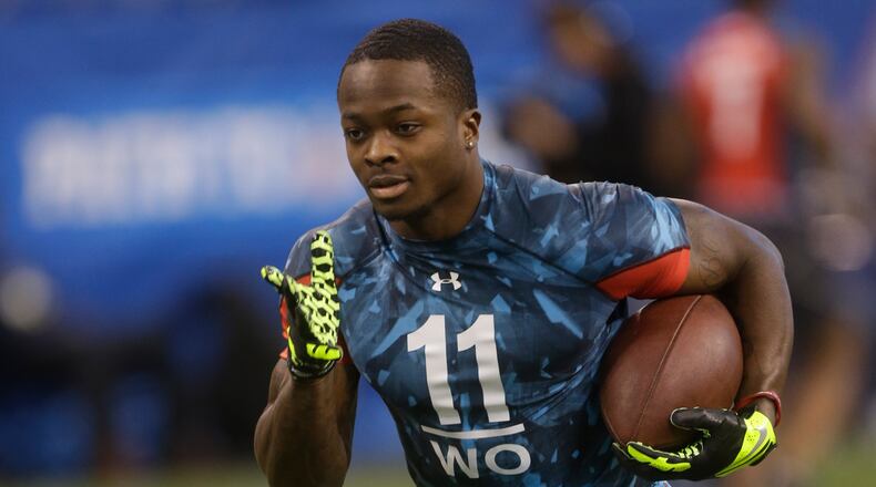 Texas receiver Marquise Goodwin runs a drill during the NFL football scouting combine in Indianapolis, Sunday, Feb. 24, 2013. (AP Photo/Dave Martin)