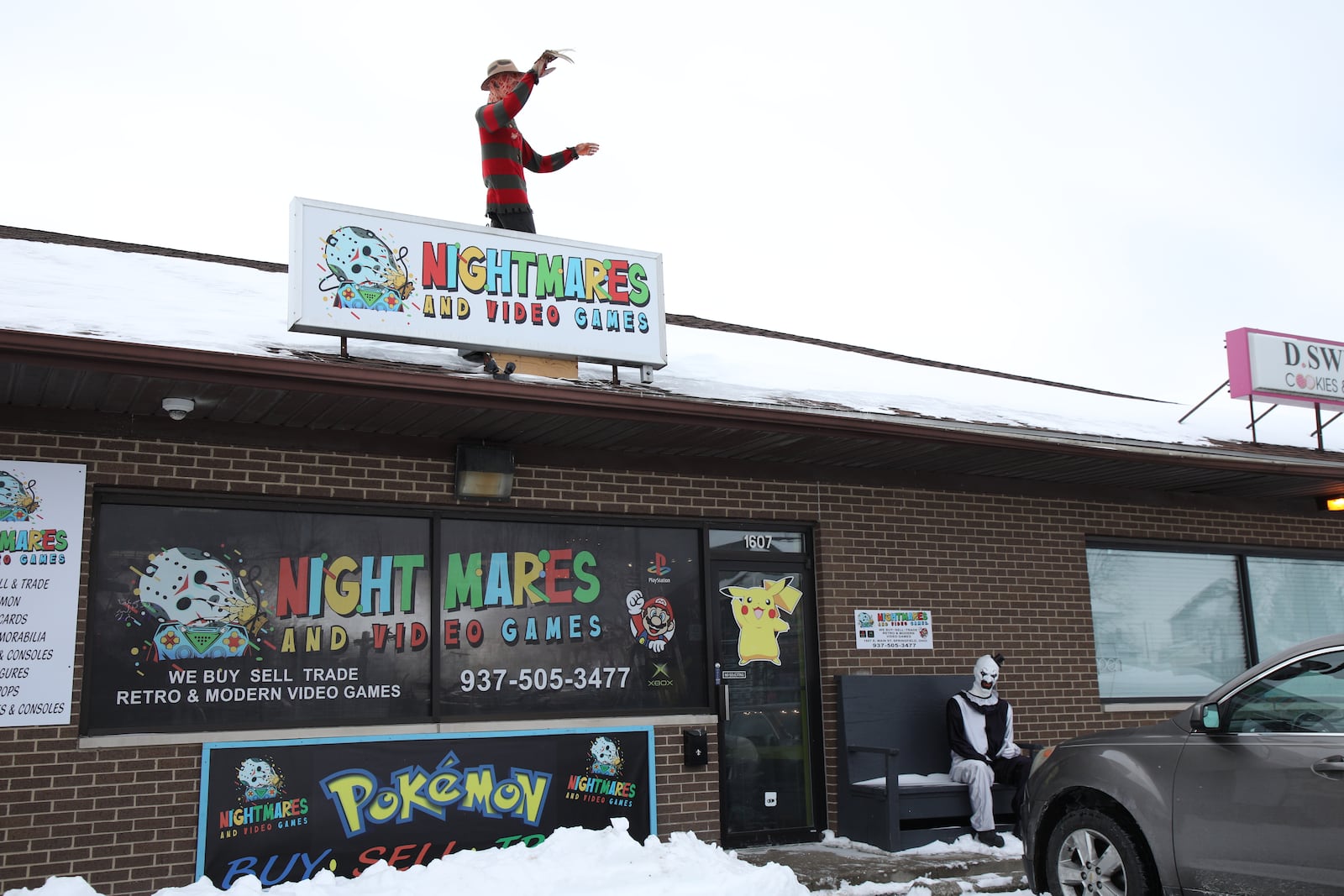 The storefront of Nightmares and Video Games at 1607 E. Main St. in Springfield. It features life-sized models of Art the Clown and Freddy Krueger, crafted by artist Bob Willmeth. BRANDON BERRY/CONTRIBUTED