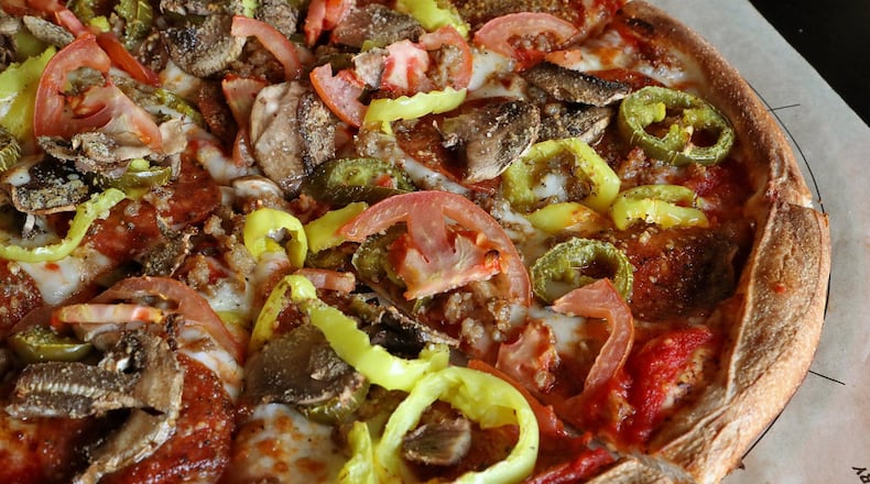 Your Rapid Fired Pizza comes out piping hot in 3 minutes. BILL LACKEY/STAFF