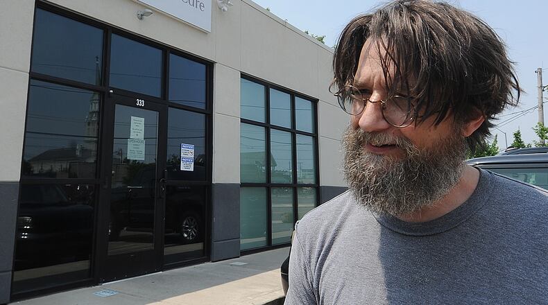 Jonathan Wright said he’s registered in Ohio’s medical marijuana program. The Montgomery County man stopped at Columbia Care in Dayton to pick up products that help him with difficulty sleeping and stomach issues. MARSHALL GORBY\STAFF
