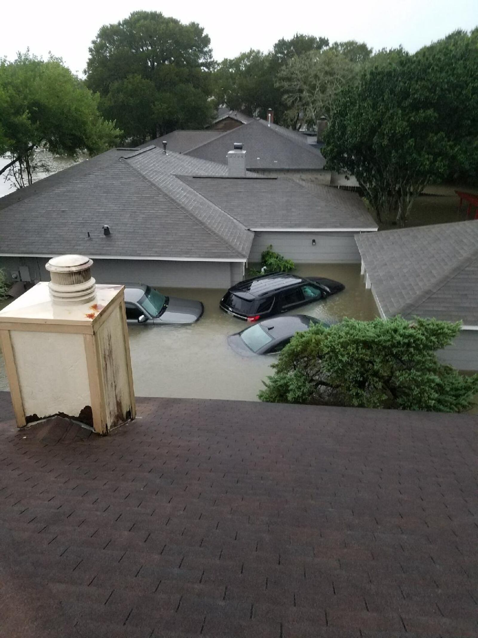 Keeley Harding's nephew, Kyle, snapped this photo from the roof of his home in Houston, where Hurricane Harvey left his home, vehicles and belongs under water. (Courtesy/Keeley Harding)