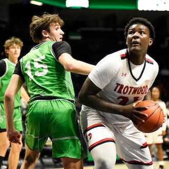The Trotwood Madison boys basketball team beat Hamilton Badin 54-48 in the Division III, Region 12 championship game on Saturday, March 14, 2026, at Xavier University's Cintas Center. GEOFF NEVILLE / CONTRIBUTED PHOTO