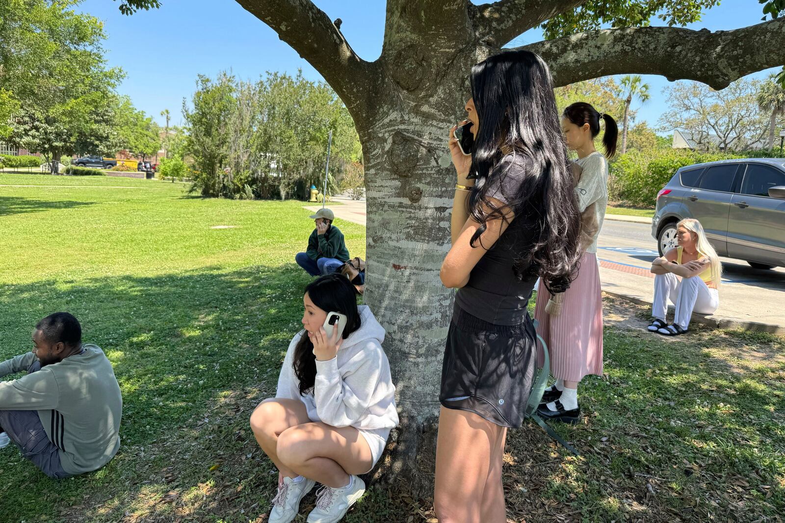 Florida State University students wait for news amid an active shooter incident at the school’s campus in Tallahassee, Fla., Thursday, April 17, 2025 (AP Photo/Kate Payne)