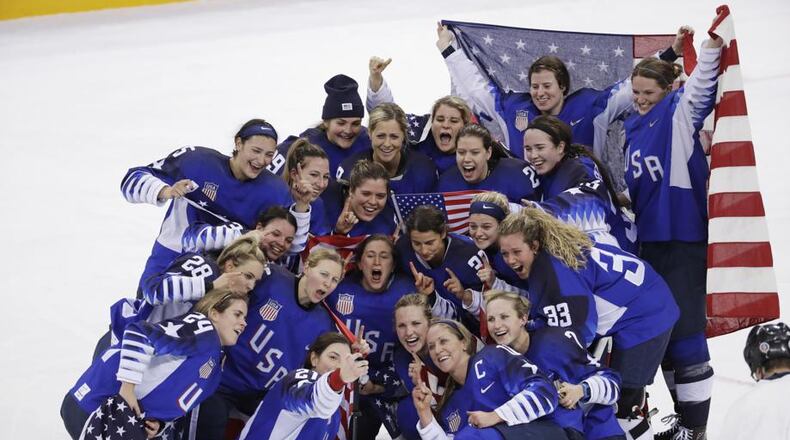 The United States team celebrates winning the women’s gold medal hockey game against Canada at the 2018 Winter Olympics in South Korea, Thursday, Feb. 22, 2018. (AP Photo/Matt Slocum)