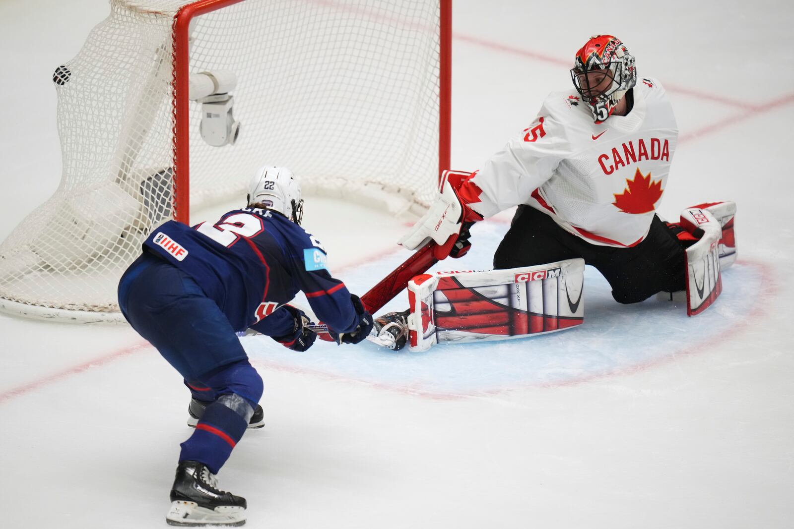 United States' Tessa Janecke scores a sucden death goal in overtime during the gold medal match between Canada and United States at the Women's Ice Hockey Championships in Ceske Budejovice, Czech Republic, Sunday, April 20, 2025. (AP Photo/Petr David Josek)