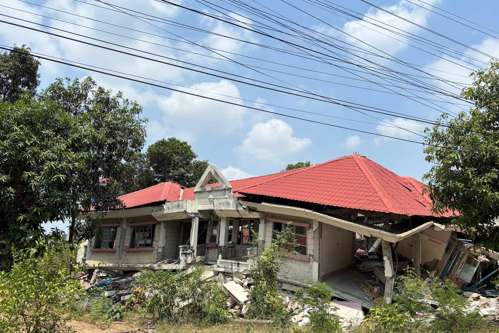 A damaged building is seen in Naypyitaw, Myanmar, Monday, April 28, 2025, one month after the earthquake. (AP Photo/Aung Shine Oo)