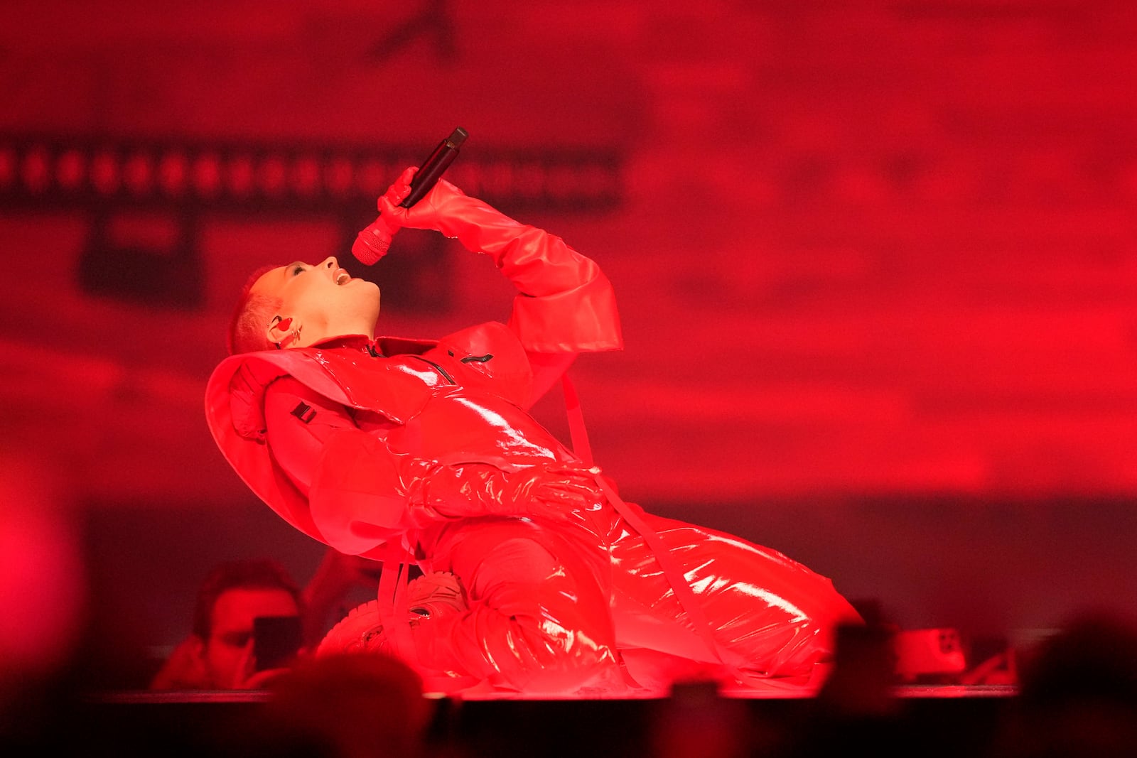 Red Sebastian from Belgium performs the song "Strobe Lights" during the dress rehearsal for the first semi-final of the 69th Eurovision Song Contest, in Basel, Switzerland, Monday, May 12, 2025. (AP Photo/Martin Meissner)