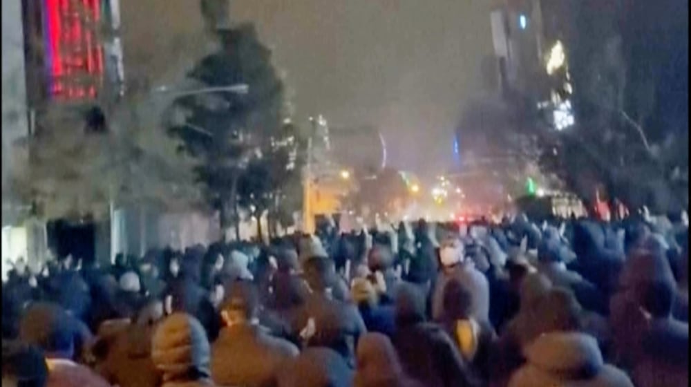 In this frame grab from footage circulating on social media from Iran showed protesters once again taking to the streets of Tehran despite an intensifying crackdown as the Islamic Republic remains cut off from the rest of the world in Tehran, Iran, Saturday Jan. 10, 2026. (UGC via AP)