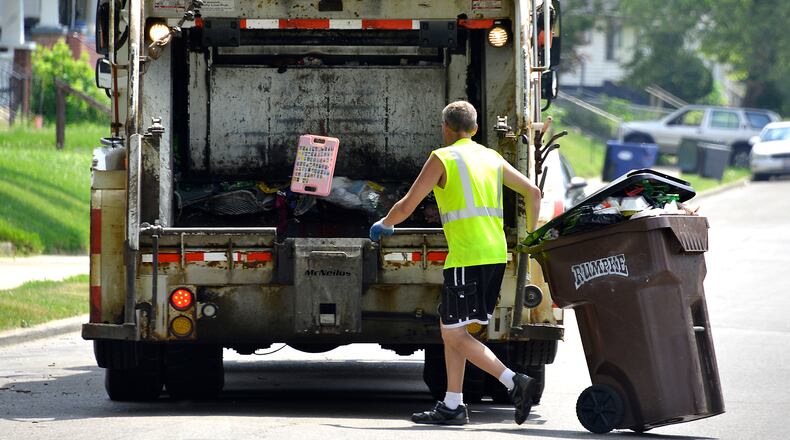 Ohio House votes to require drivers to move over for trash trucks. Bill Lackey/Staff