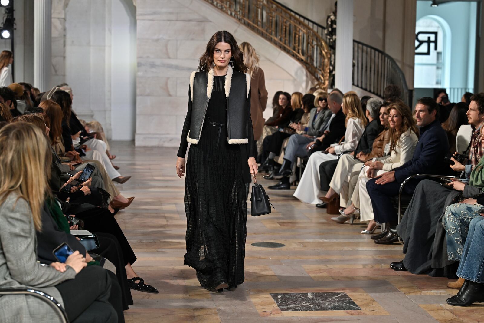 A model walks the runway at the Ralph Lauren Fall 2025 presentation on Thursday, April 17, 2025, in New York. (Photo by Evan Agostini/Invision/AP)