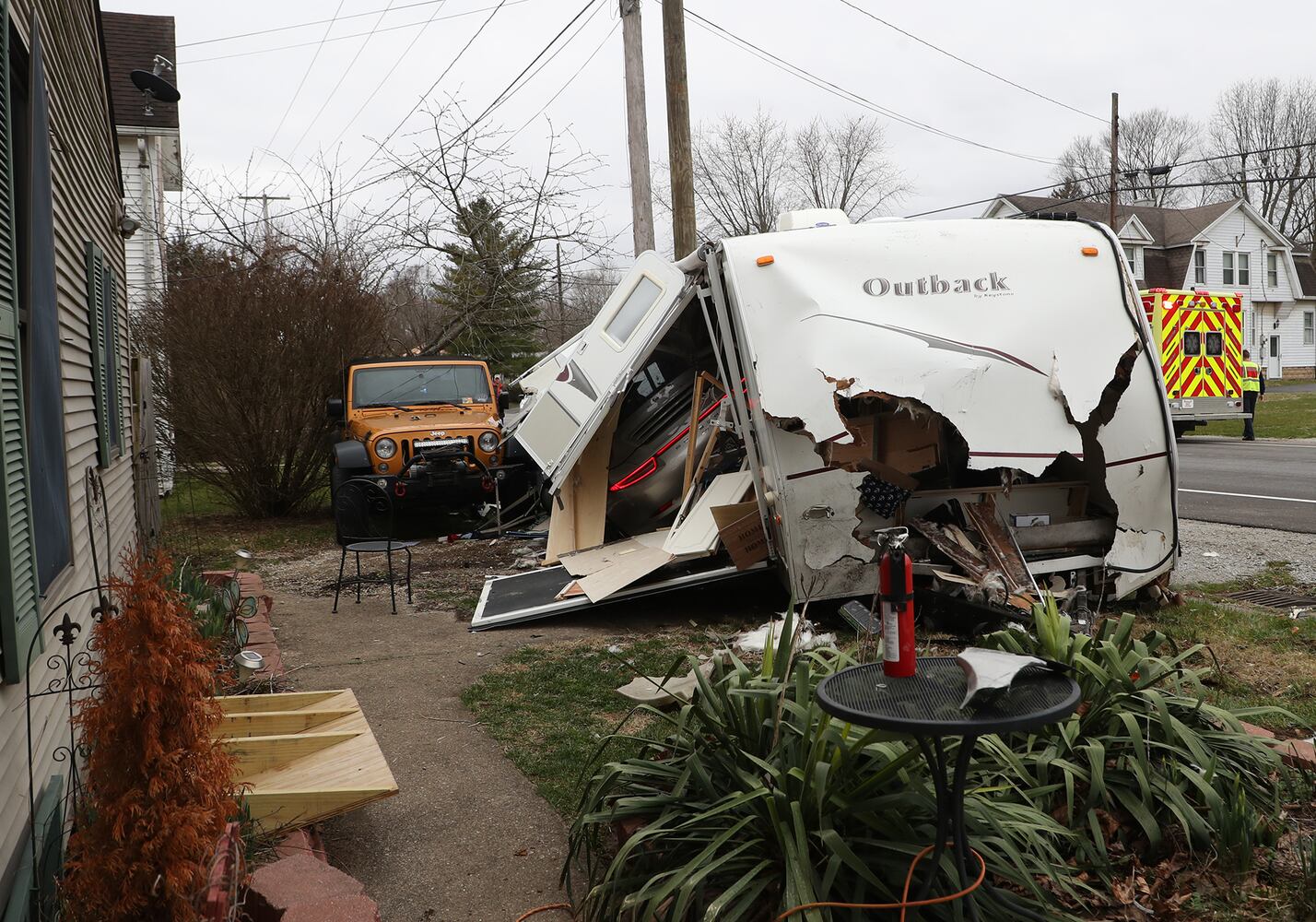PHOTOS: Porsche Crashes Through Camper