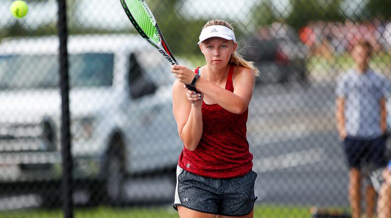 Northwestern High School junior Macy Yeager returns a shot during a match last season in Springfield. Yeager finished third at the D-II sectional tournament at Troy High School last weekend, qualifying for the D-II district tournament in Mason. CONTRIBUTED PHOTO BY MICHAEL COOPER