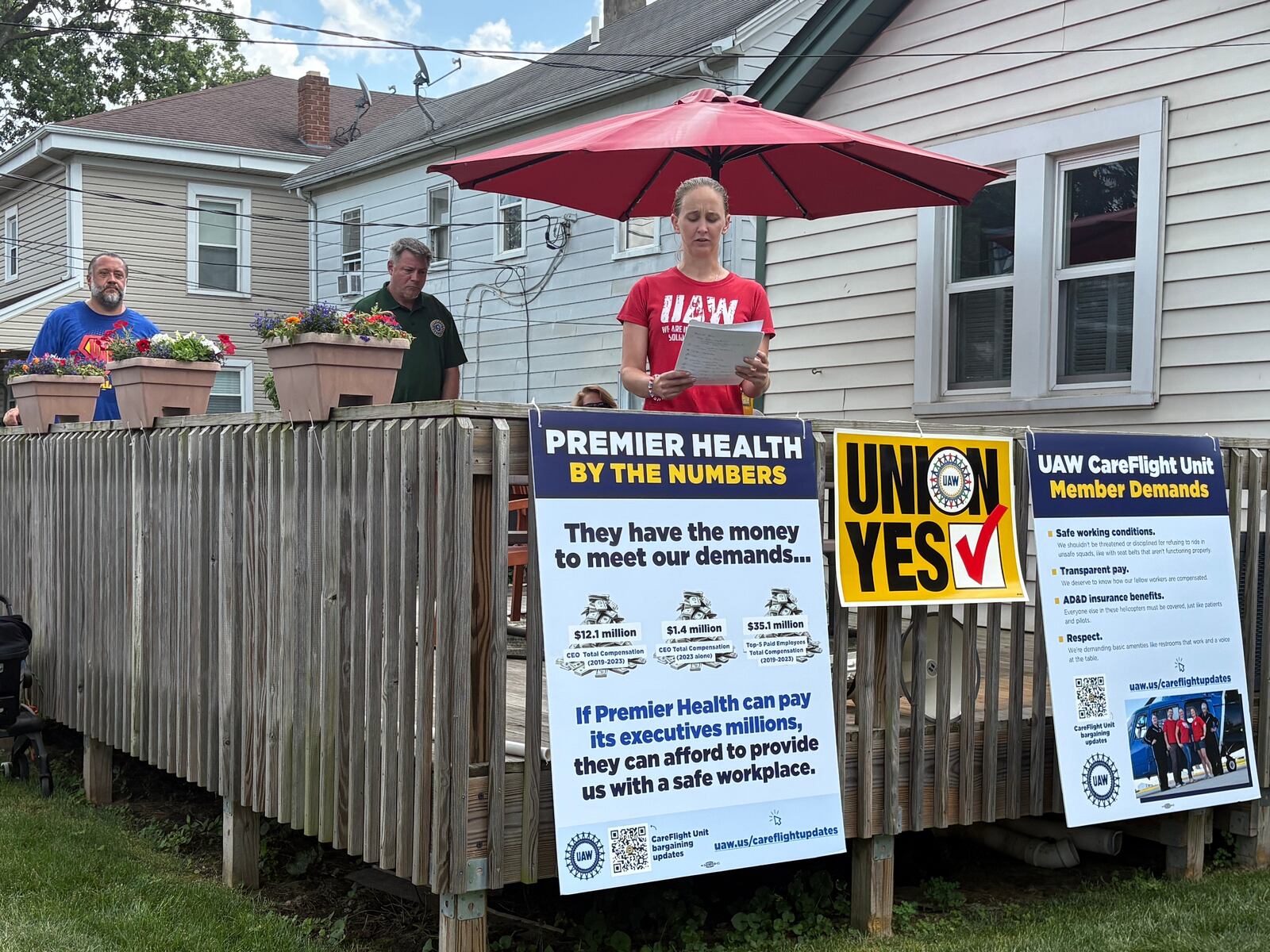 CareFlight flight nurse Nicole Coleman speaks at a rally Friday, June 27, 2025, in support of a contract between the United Auto Workers representing CareFlight nurses and medics and Premier Health. JEN BALDUF/STAFF