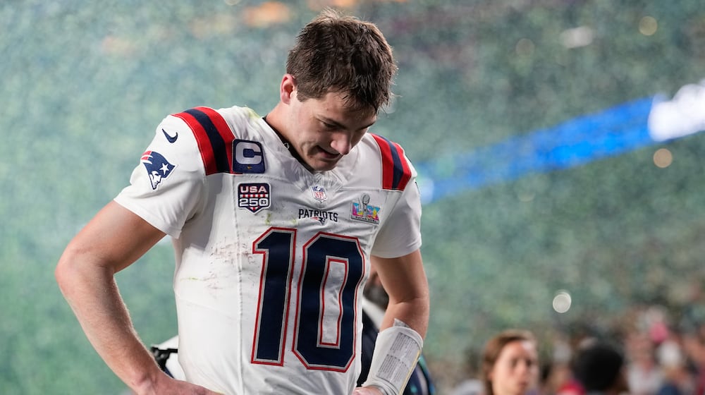 New England Patriots quarterback Drake Maye walks off the field after a loss to the Seattle Seahawks in the NFL Super Bowl 60 football game, Sunday, Feb. 8, 2026, in Santa Clara, Calif. (AP Photo/Julio Cortez)