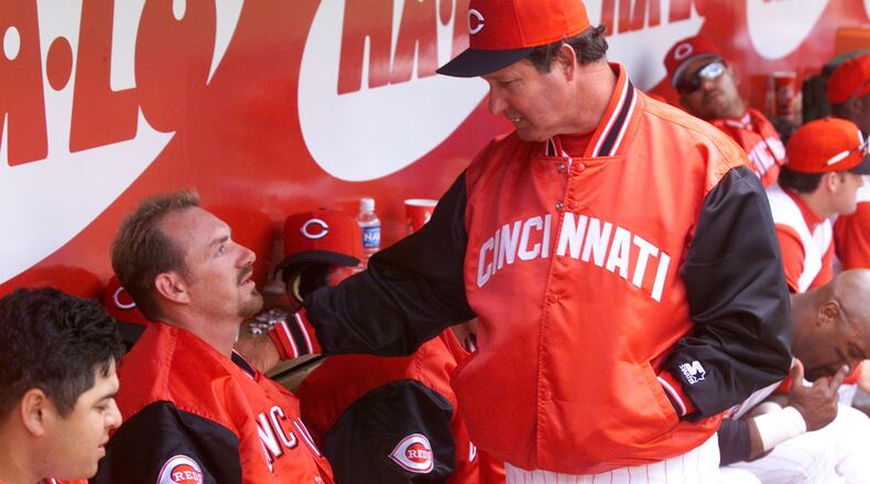 Pitching coach Don Gullett consoles pitcher Gabe White after White allowed three runs in the eighth inning putting San Francisco ahead.