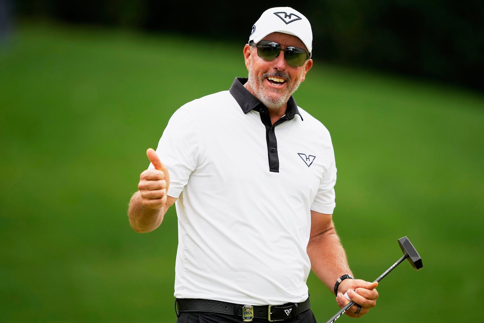 Phil Mickelson gestures on the eighth hole during the second round of the PGA Championship golf tournament at the Quail Hollow Club, Friday, May 16, 2025, in Charlotte, N.C. (AP Photo/Matt York)