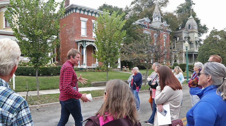 Springfield historian Kevin Rose leads a tour of the historic homes along South Fountain Avenue on Oct. 1, 2022. BILL LACKEY/STAFF