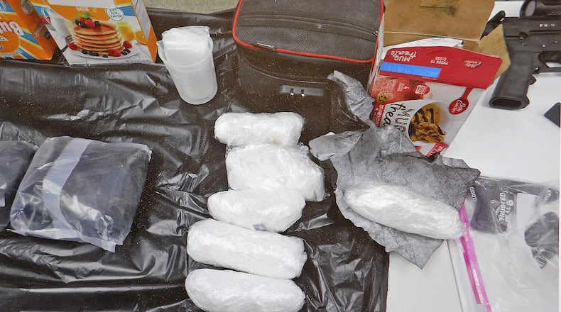 German Twp. Police recovered over four pounds of meth, two AK-47s with armour piercing ammunition and over $11 thousand when they arrested two individuals for shoplifting at Rural King in May 2021. BILL LACKEY/STAFF