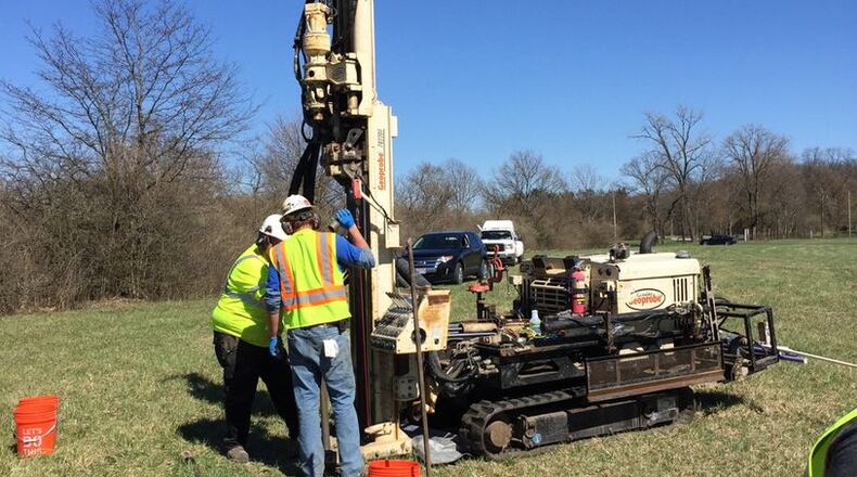 Wright Patterson Force Base crews collect drinking water samples from a field in Fairborn where a jet crashed in 1997. The base sampled 22 wells in nearby neighborhoods for a group of contaminants known as PFAS. Contributed