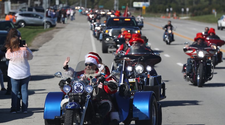 More than 3,400 motorcyclists participated in the 43rd Annual Highway Hikers Motorcycle Club Toy Run Sunday. The record number of motorcycles stretched out across Clark County as they rode from Lake Road near Medway to the Clark County Fairgrounds. The proceeds from the Toy Run, either in the form of toys or money, helps the Springfield Salvation Army supply Christmas presents to needy children in Clark County. Last year the Salvation Army supplied presents to over 3,000 children at Christmas. BILL LACKEY/STAFF