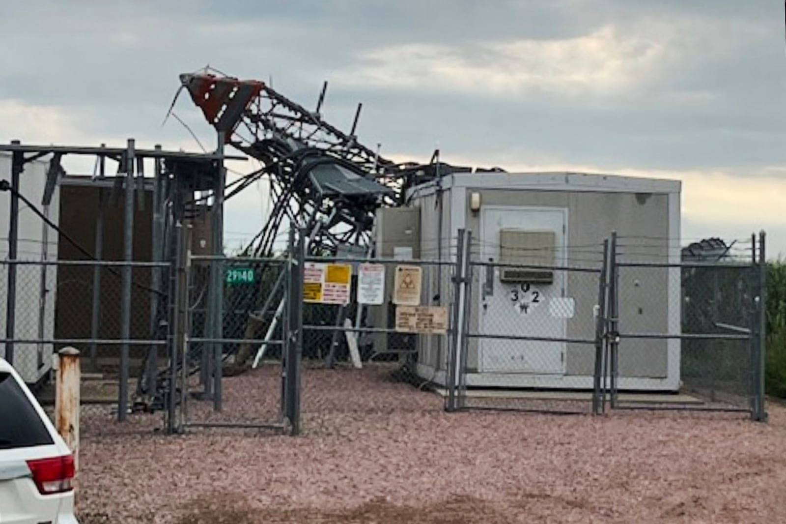 In this image provided by the Lincoln County, S.D., Sheriff's Office, a cell tower sustained damage following strong winds overnight in southern Lincoln County, South Dakota, Tuesday, July 29, 2025. (Sgt. E.J. Colshan/Lincoln County Sheriff's Office via AP)