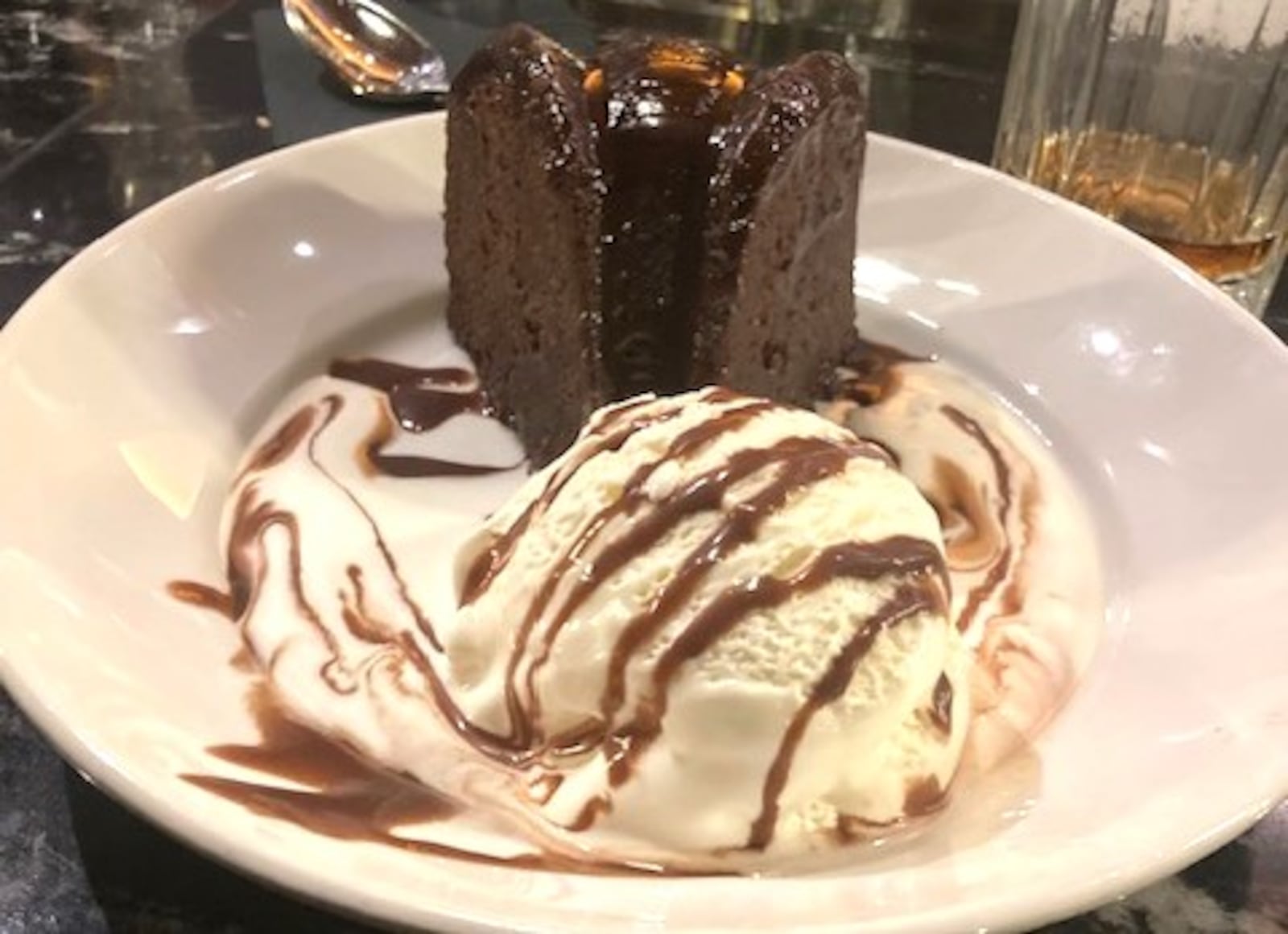 The chocolate bundt cake at J. Alexander's in Dayton is a dense, rich cake. RAY MARCANO/CONTRIBUTED