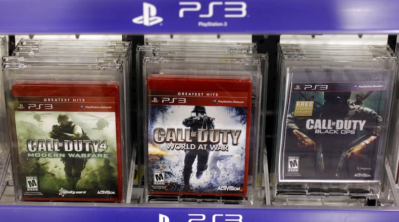 FILE - Three versions of Activision's Call Of Duty games are seen on sale at Best Buy, in Mountain View, Calif., Wednesday, Aug. 3, 2011. (AP Photo/Paul Sakuma, File)