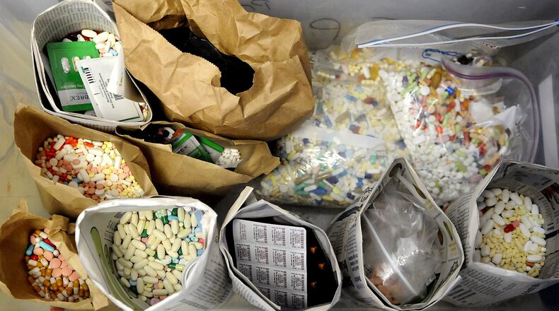 Prescription medications dropped in a collection box at an area police department. MARSHALL GORBY/ STAFF FILE