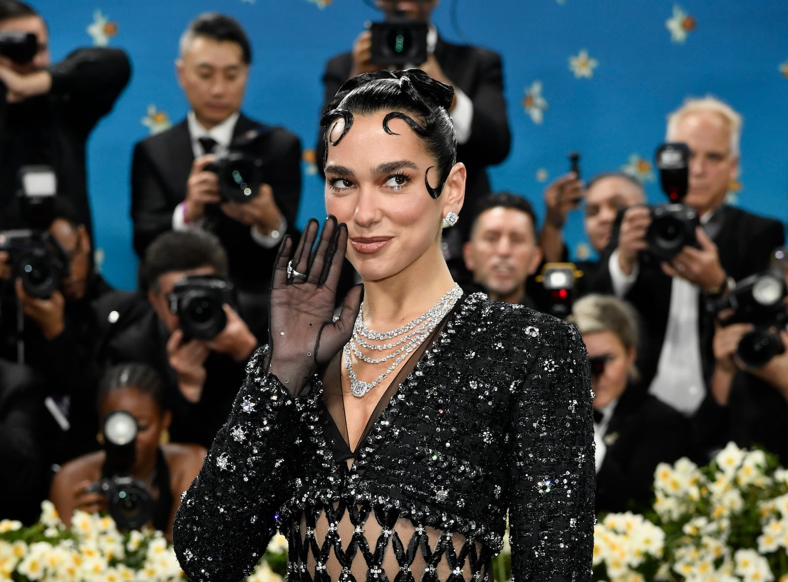 Dua Lipa attends The Metropolitan Museum of Art's Costume Institute benefit gala celebrating the opening of the "Superfine: Tailoring Black Style" exhibition on Monday, May 5, 2025, in New York. (Photo by Evan Agostini/Invision/AP)