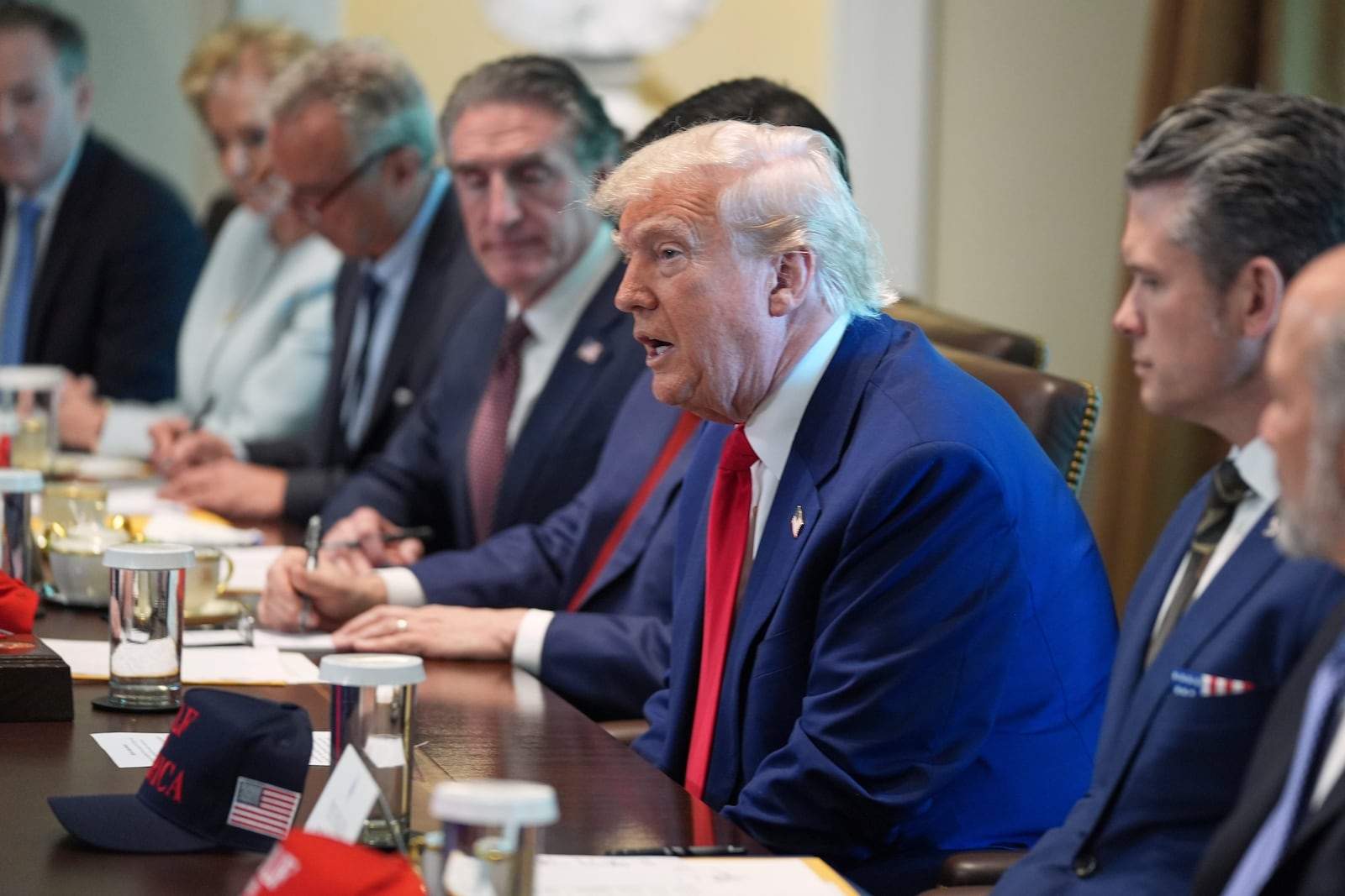 President Donald Trump speaks during a cabinet meeting at the White House, Wednesday, April 30, 2025, in Washington. (AP Photo/Evan Vucci)