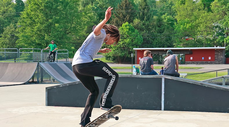A skateboarder skates at the Springfield skate park on Mitchell Boulevard on Wednesday evening May 17, 2023, near the National Trail Parks and Recreation District headquarters. NTPRD and the Clark County Park District are considering a merger. BILL LACKEY/STAFF
