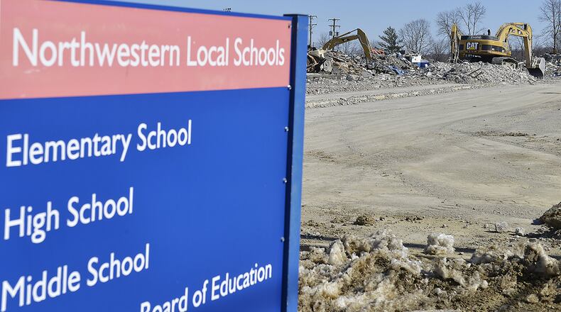 There’s nothing left of Northwestern Middle School but rubble Friday as a demolition crew finishes knocking the building down. The elementary school is the only original building still standing and it is scheduled join the other two today. Bill Lackey/Staff