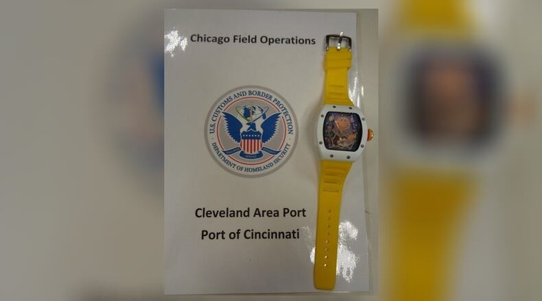 A replica of a Richard Mille 88 Automatic Winding Tourbillon Smiley watch, of which the real one is valued in the millions, was recently seized by U.S. Customs and Border Patrol officers in Cincinnati. it had been shipped to the U.S. from India and was headed to Palm Beach, Fla. CONTRIBUTED