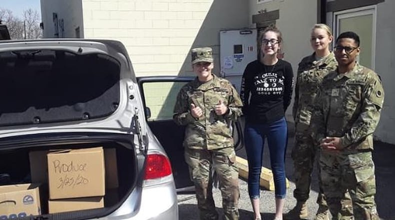 Your Ride Home Driver Ciera Bannick and Dispatcher Kassie James volunteered in delivering food for Second Harvest Food Bank. They helped 13 families in need.