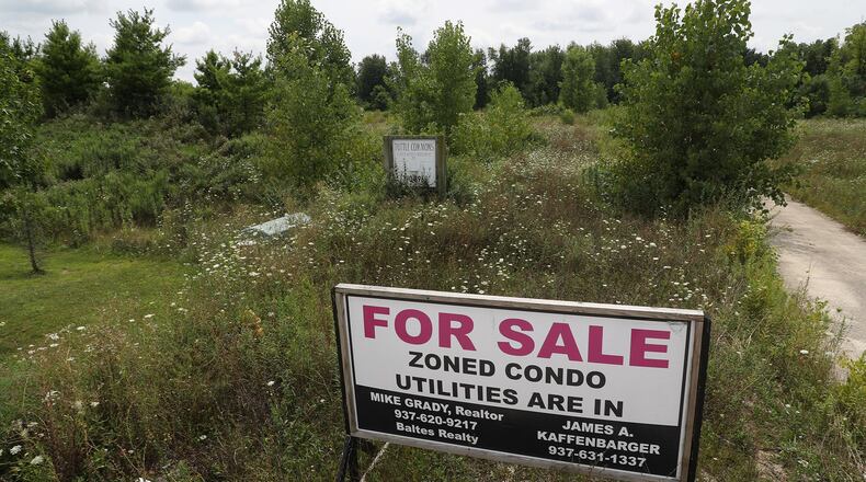 A propose housing development will be built in an area at the end of South Tuttle Road, behind Walmart. BILL LACKEY/STAFF