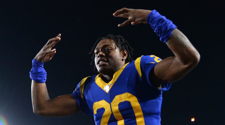 FILE - Los Angeles Rams cornerback Jalen Ramsey celebrates the team's win over the Chicago Bears in an NFL football game Sunday, Nov. 17, 2019 in Los Angeles. Jalen Ramsey will become the highest-paid defensive back in NFL history after agreeing to a five-year, $105 million contract extension with the Rams. The extension announced Wednesday, Sept. 9, 2020, includes $71.2 million, the most guaranteed money ever given to a defensive back, according to Ramsey's agent, David Mulugheta.(AP Photo/Kyusung Gong, File)