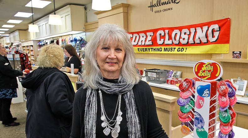 Katie Simpkins, the owner of Katie's Hallmark in the Northland Shopping Center, says she's sad to be closing the business in March. Katie has owned the Hallmark Gold Crown store for 20 years. BILL LACKEY/STAFF