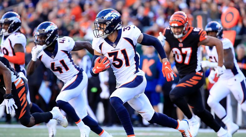 CINCINNATI, OH - DECEMBER 2: Justin Simmons #31 of the Denver Broncos runs with the ball after intercepting a pass during the third quarter of the game against the Cincinnati Bengals at Paul Brown Stadium on December 2, 2018 in Cincinnati, Ohio. (Photo by Andy Lyons/Getty Images)