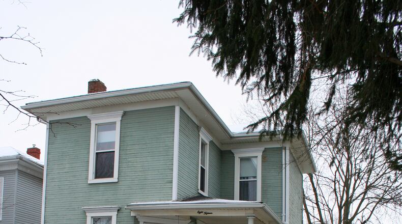 Built in 1900, this two-story home at 815 N. Main in Urbana features high ceilings and turn-of-the-century charm. Listed at $98,000, the home has three bedrooms and a beautiful formal dining room.