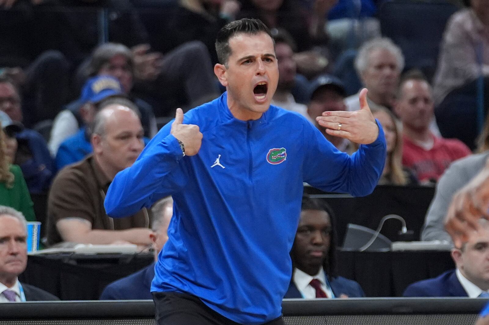 Florida head coach Todd Golden reacts from the sideline during the first half in the Sweet 16 of the NCAA college basketball tournament against Maryland, Thursday, March 27, 2025, in San Francisco. (AP Photo/Marcio Jose Sanchez)