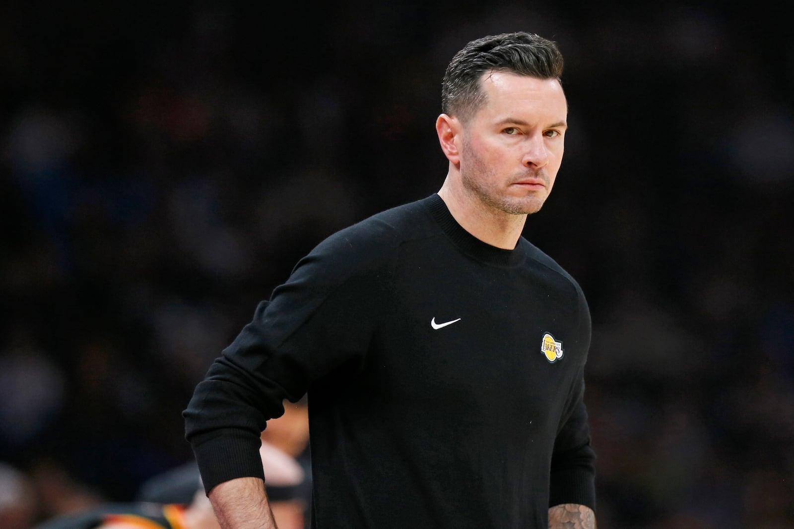 Los Angeles Lakers coach JJ Redick looks on during the first half of an NBA basketball game against the Oklahoma City Thunder, Sunday, April 6, 2025, in Oklahoma City. (AP Photo/Nate Billings)