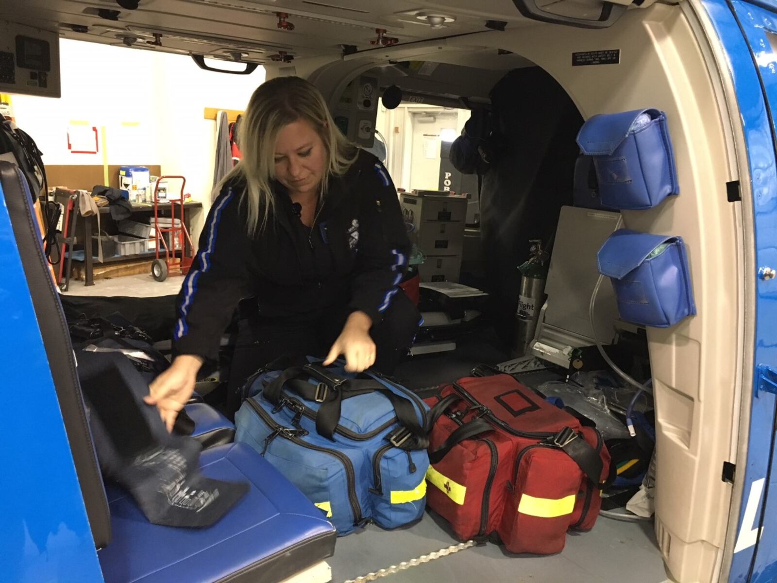 Care Flight flight nurse Mandy Vai showing some of the medical equipment kept on board one of their helicopters